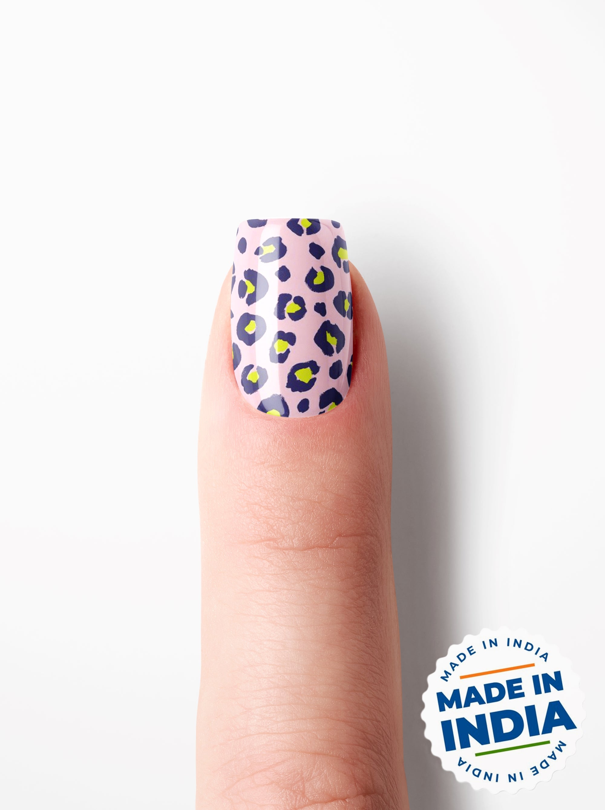 Nail with leopard print design on a white background with 'Made in India' label.