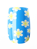 Blue pool float with white and yellow floral pattern on a white background